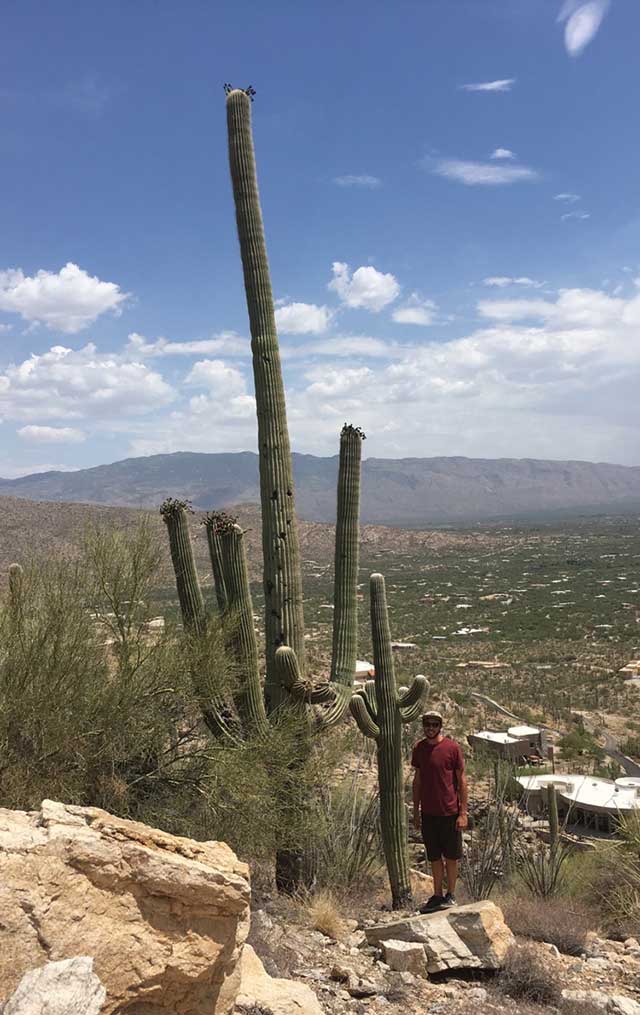 Standing next to a giant Saguaro